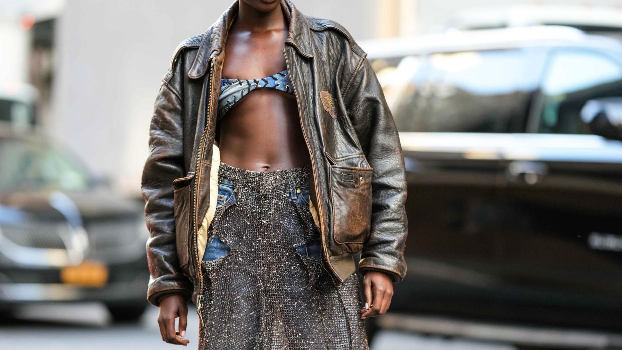 woman wearing distressed leather jacket