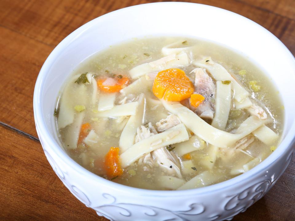 A bowl of chicken noodle soup.