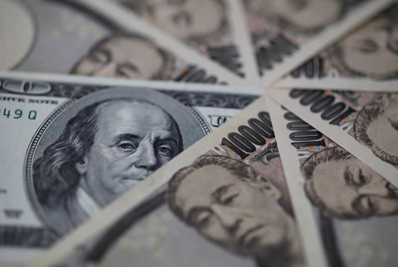 FILE PHOTO: Illustration photo of U.S. dollar and Japan yen notes