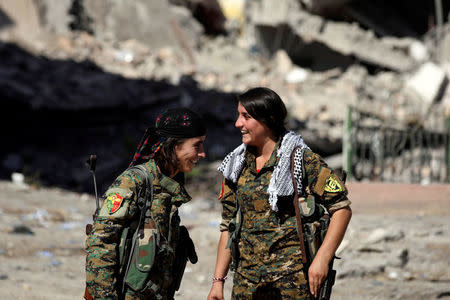 Female fighters from the Syrian Democratic Forces in Raqqa. REUTERS/Rodi Said