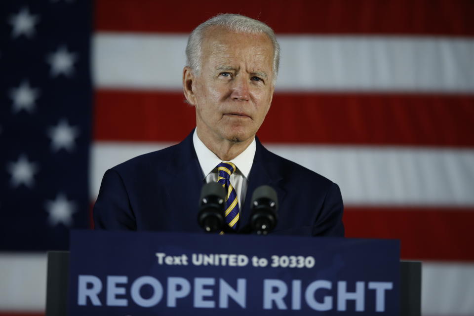 FILE - In this June 17, 2020, file photo Democratic presidential candidate, former Vice President Joe Biden pauses while speaking, in Darby, Pa. Amid a summer of racial unrest and calls for more diversity in leadership, President Donald Trump lags Democratic rival Joe Biden in the percentage of people of color on their campaign staffs, according to data the campaigns provided to The Associated Press. (AP Photo/Matt Slocum, File)