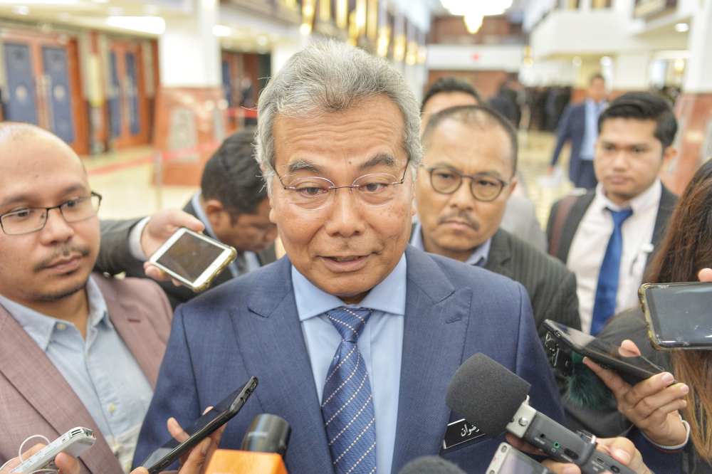 Entrepreneur Development Minister Datuk Seri Mohd Redzuan Md Yusof speaks to the media at the Parliament building in Kuala Lumpur November 20, 2019. ― Picture by Shafwan Zaidon