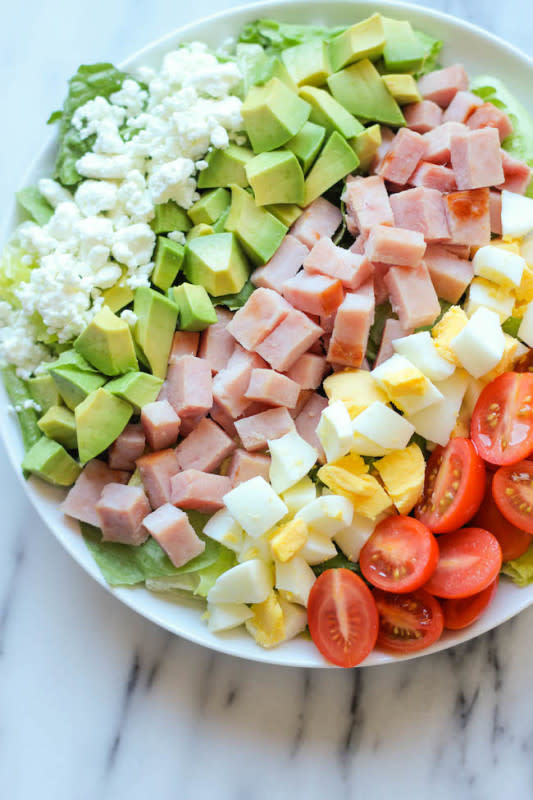 <p>Damn Delicious</p><p>Use up your leftover ham in this glorious cobb salad with a healthy, guiltless Greek yogurt ranch dressing! It’s the perfect post-Thanksgiving detox! </p><p><strong>Get the recipe: <a href="https://damndelicious.net/2013/11/28/ham-cobb-salad/" rel="nofollow noopener" target="_blank" data-ylk="slk:Leftover Ham Cobb Salad;elm:context_link;itc:0;sec:content-canvas" class="link ">Leftover Ham Cobb Salad</a></strong></p>