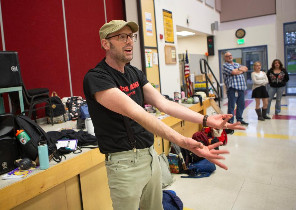 North Eugene's drama director, Aaron Thomas, directs Madison Middle School students during rehearsal for the musical Willy Wonka.