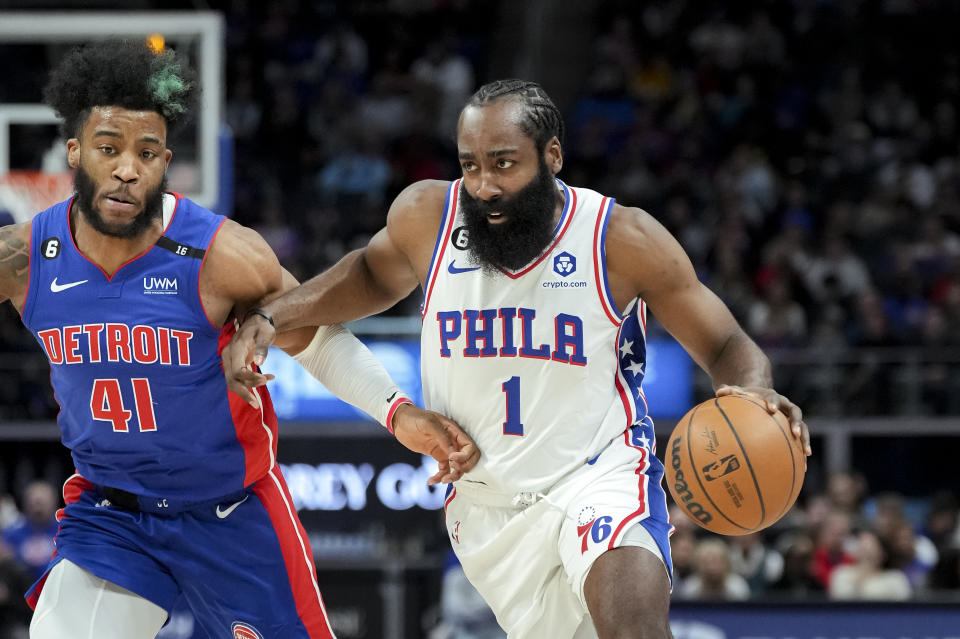 Philadelphia 76ers guard James Harden handles the ball against Detroit Pistons forward Saddiq Bey at Little Caesars Arena in Detroit on Jan. 8, 2023. (Nic Antaya/Getty Images)