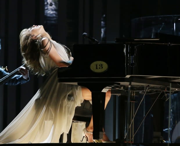 <p> Taylor Swift performs her fan-favorite track "All Too Well" at the Grammys on Jan. 26, 2014.</p><p>Michael Tran/FilmMagic</p>