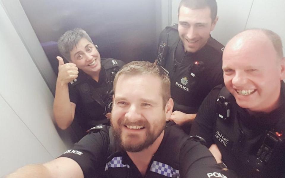 The officers saw the funny side of the situation, posting a picture on Twitter of them smiling in the lift along with the caption: #awkward - Brighton and Hove Police/Twitter