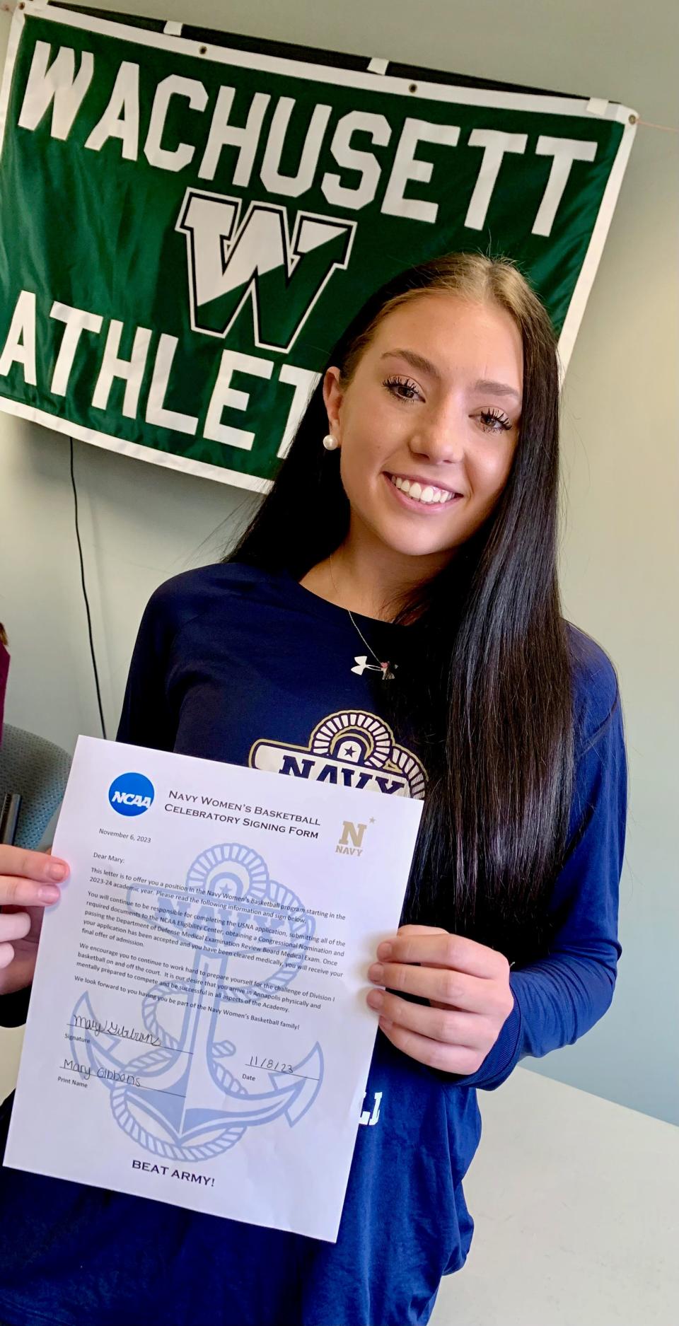 Wachusett's Mary Gibbons poses with her National Letter of Intent to play basketball at the United States Naval Academy next year.