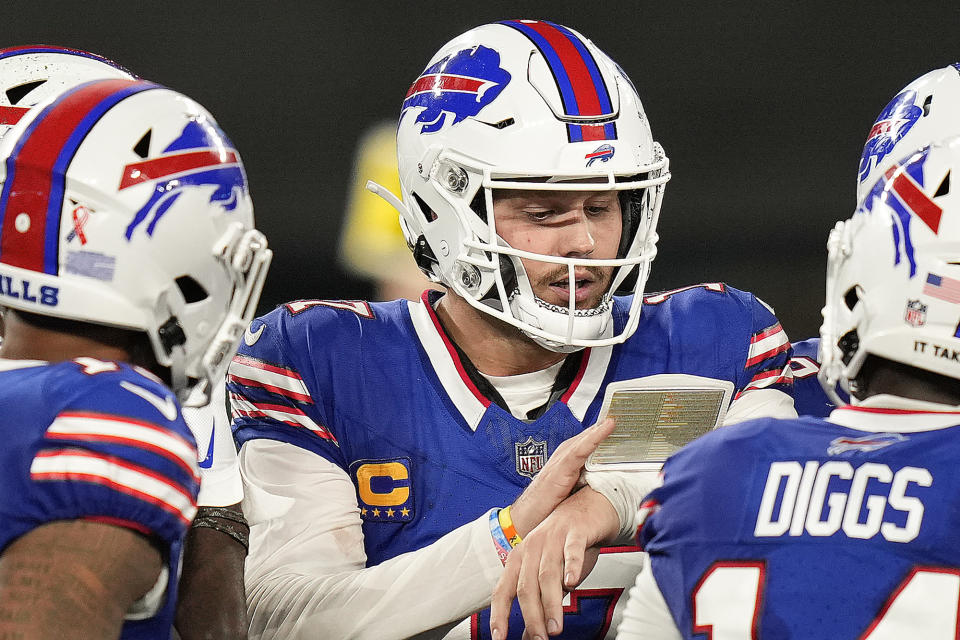 Buffalo Bills quarterback Josh Allen (17) calls a play in the huddle during the third quarter of an NFL football game against the New York Jets , Monday, Sept. 11, 2023, in East Rutherford, N.J. (AP Photo/Seth Wenig)