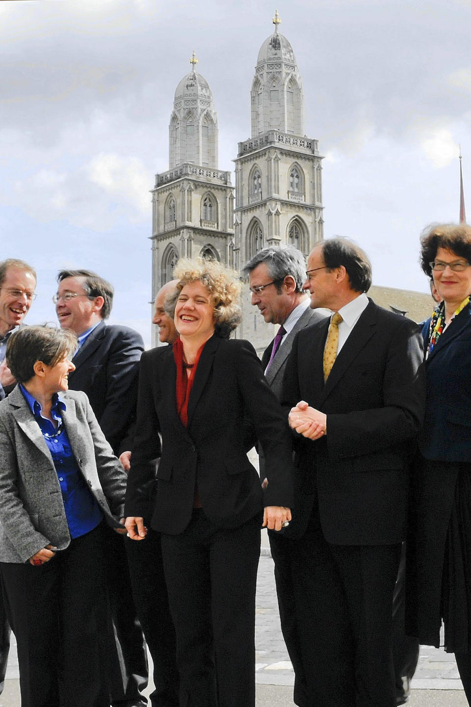 In this Wednesday, March, 21, 2010 photo, new members of the Zurich City Council stand with Mayor Corine Mauch, center, in Zurich. Mauch was born a U.S. citizen to Swiss parents who were college students in Iowa. They lived in the U.S. until she was 5, then again for two more years before she turned 11. (AP Photo/Keystone, Walter Bieri)