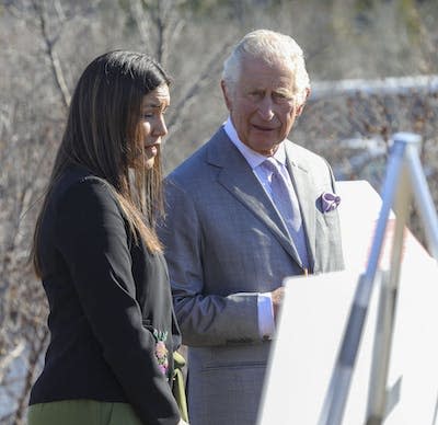 Dahti Tetso speaks with Prince Charles, now King Charles, about the Indigenous Leadership Initiative in Yellowknife, Northwest Territories, May 19, 2022. THE CANADIAN PRESS/Bill Braden