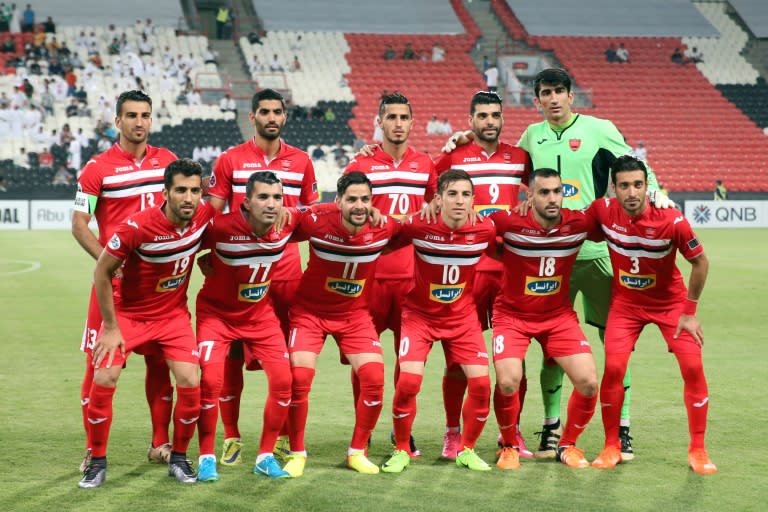 Persepolis' players pose for a photo ahead of their AFC Champions League quarter-final 2nd leg match against al-Ahli, at the Mohammed Bin Zayed Stadium in Abu Dhabi, on September 12, 2017