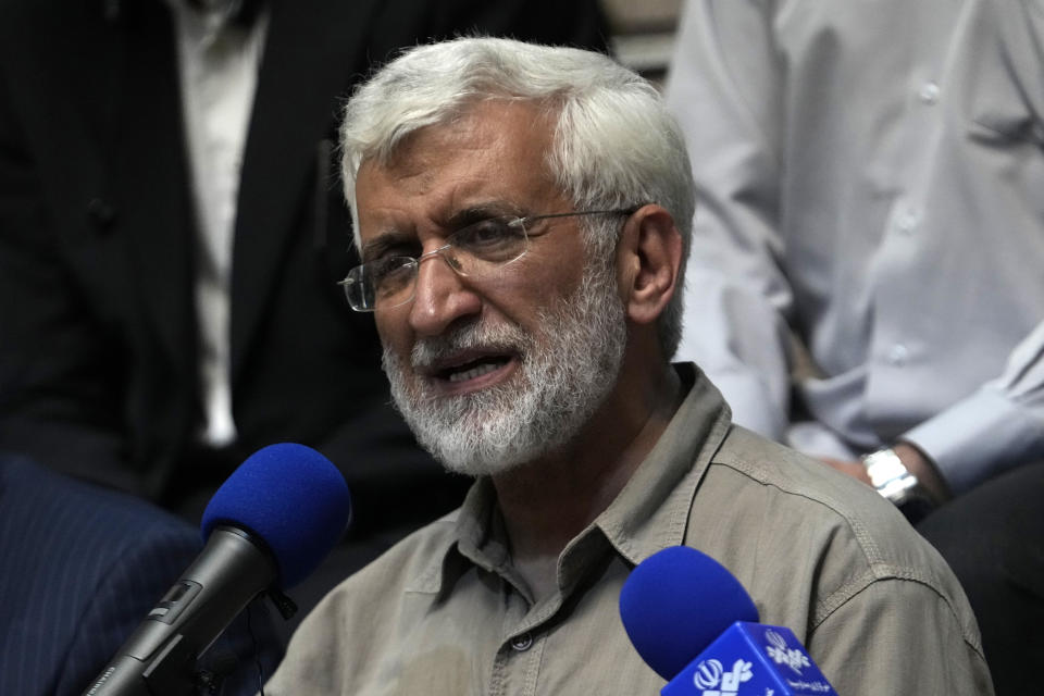 Candidate for the presidential election Saeed Jalili, a former Iranian top nuclear negotiator, speaks to a group of athlete supporters in his campaign meeting at a sport hall in Tehran, Iran, Sunday, June 30, 2024. Comments suggesting that Iran's reformist presidential candidate could increase government-set gasoline prices have raised fears of a repeat of nationwide protests. (AP Photo/Vahid Salemi)