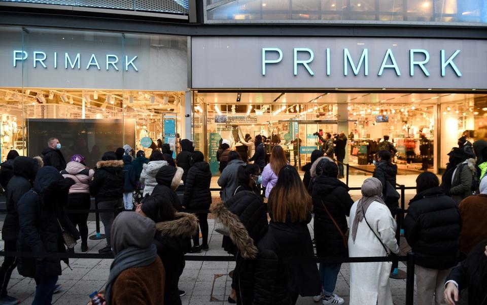 Early morning shoppers at Primark, in Birmingham, as England takes another step back towards normality with the further easing of lockdown restrictions.  - Jacob King 