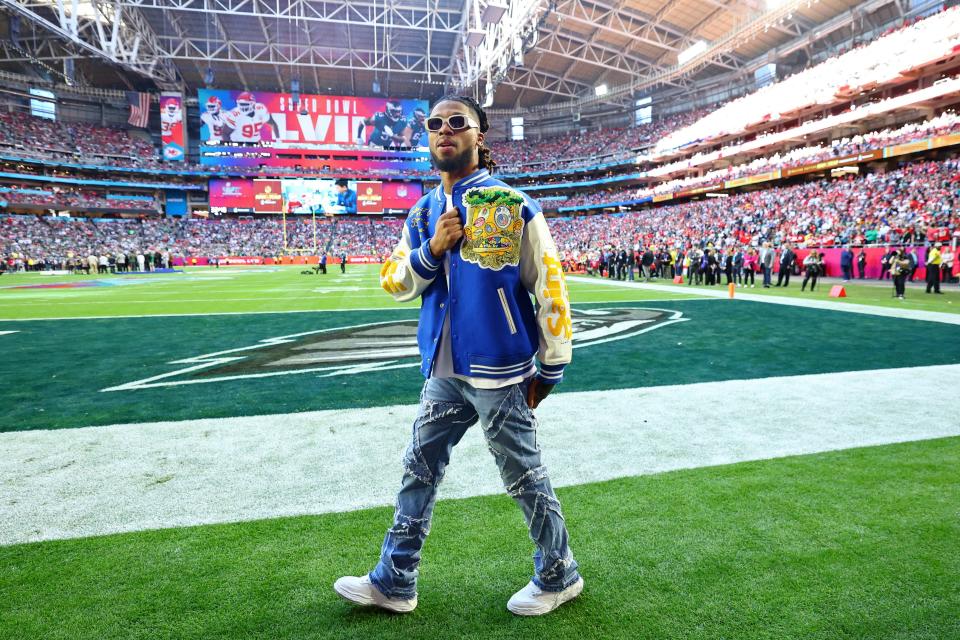 Buffalo Bills safety Damar Hamlin walks on the sideline before Super Bowl 57.