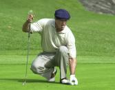 <p>Sylvester Stallone lines up a putt during the 3rd Annual Elizabeth Glaser Pediatric Aids Foundation Celebrity Golf Classic at Riviera Country Club in 2001.</p>