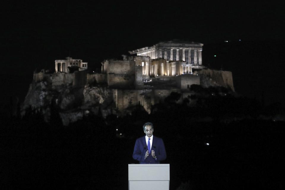 FILE - Greece's Prime Minister Kyriakos Mitsotakis speaks during a ceremony for the new lighting system of the Acropolis in Athens, on Sept. 30, 2020. Greece's prime minister says Thursday, May 11, 2023 his government is exploring a “win-win” solution to one of the world’s most intractable cultural heritage disputes: The fate of the Parthenon Sculptures currently in the British Museum. But he rules out any deal that would include the word “loan.” (AP Photo/Yorgos Karahalis, File)