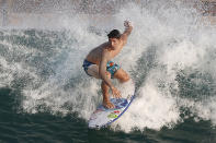 Surfer Gabriel Medina of Brazil works out on a Surf Ranch wave during practice rounds for the upcoming Olympics Wednesday, June 16, 2021, in Lemoore, Calif. This year, Medina and fellow Brazilian Italo Ferreira are expected to rule the men's competition at surfing's long-awaited debut as an Olympic sport in the Tokyo 2020 Games. While the surfing community has long pledged that the ocean is for everyone, a look at the professional ranks show a sport that remains expensive and inaccessible. A series of recent industry efforts to help groom the next generation outside of the usual hot spots of Hawaii, California and Australia look to be a tacit acknowledgement of the existing disparities among its talent bench. (AP Photo/Gary Kazanjian)