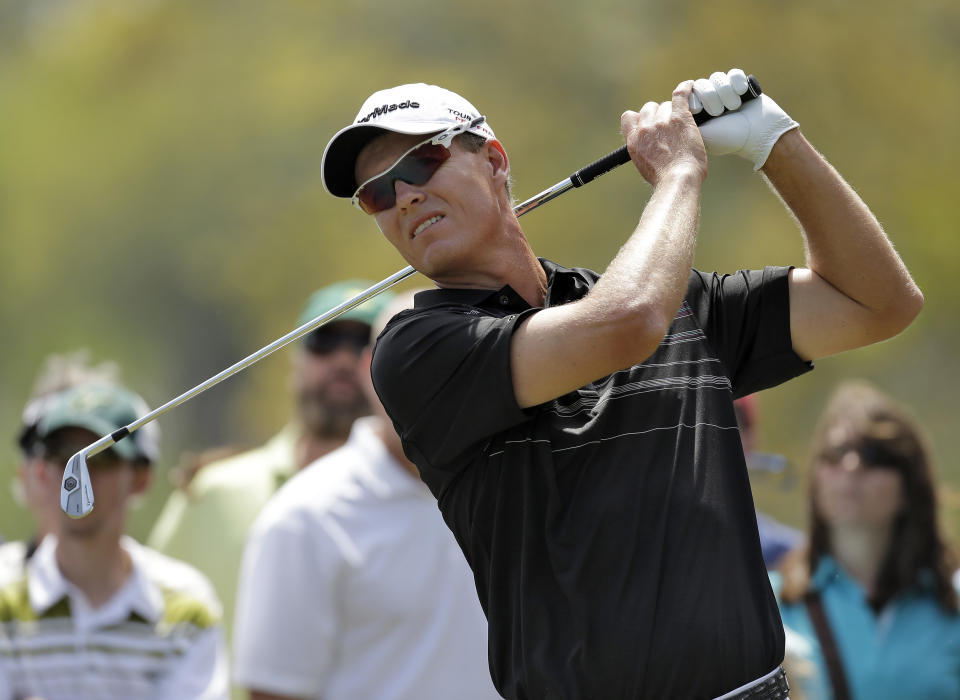 John Senden, of Australia, tees off on the second hole during the final round of the Valspar Championship golf tournament at Innisbrook, Sunday, March 16, 2014, in Palm Harbor, Fla. (AP Photo/Chris O'Meara)