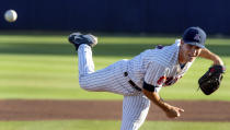 Arizona pitcher Dawson Netz delivers against Mississippi during the top of the first inning of an NCAA college baseball super regional game Sunday, June 13, 2021, in Tucson, Ariz. (Rebecca Sasnett/Arizona Daily Star via AP)