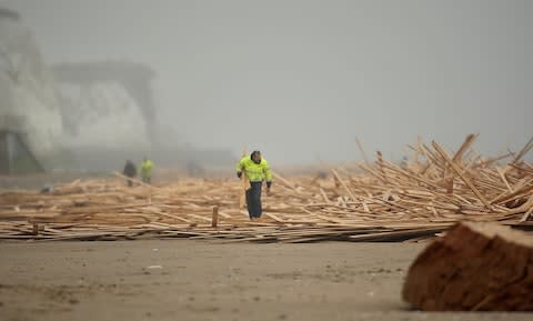 A cargo of timber lost from the Russian ship 'Sinegorsk' washes ashore near Ramsgate in Kent - Credit: Getty