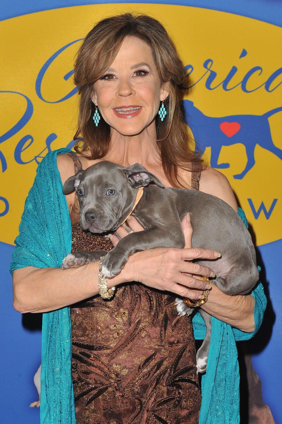 Linda Blair and a dog