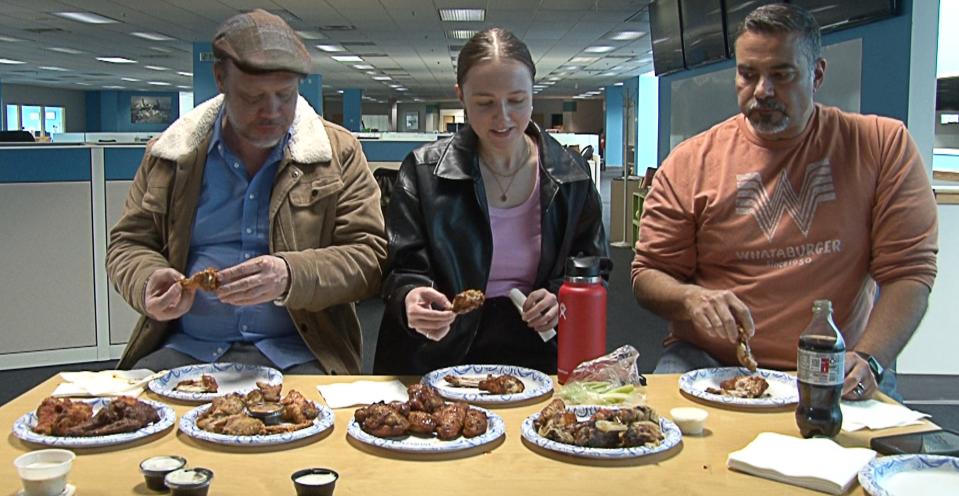 (Left to right) News Journal reporters Matthew Korfhage, Molly McVety and Esteban Parra recently sampled the chicken wings from the businesses that readers selected as the final four in the Delaware Wing Madness bracket challenge.