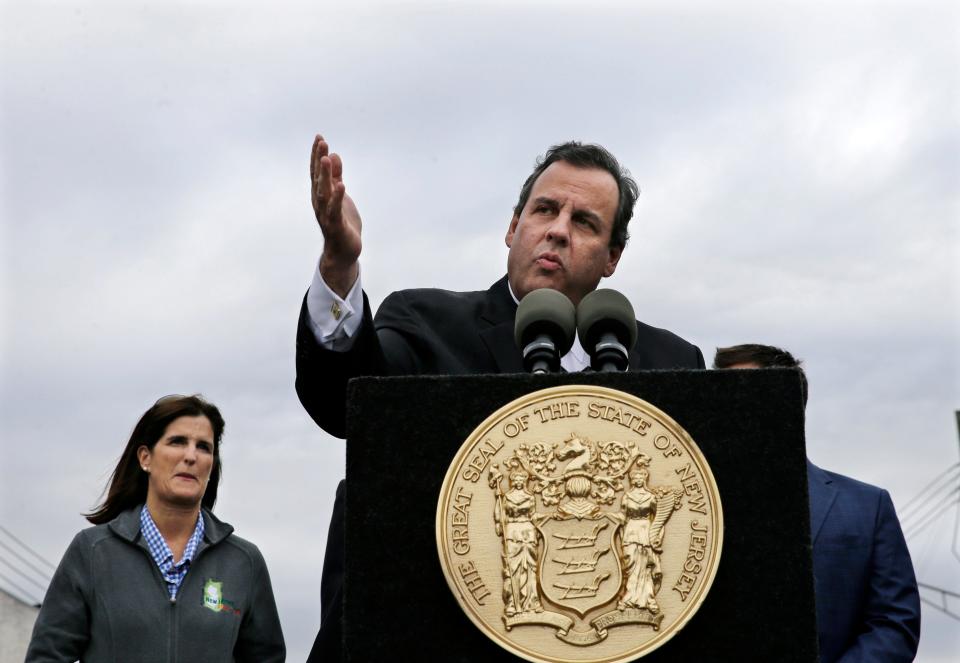 In this Oct. 29, 2014 file photo, New Jersey Gov. Chris Christie, accompanied by his wife Pat Christie, tells heckler Jim Keady to: "Sit down and shut up," during a event marking the second anniversary of Superstorm Sandy, in Belmar, N.J.