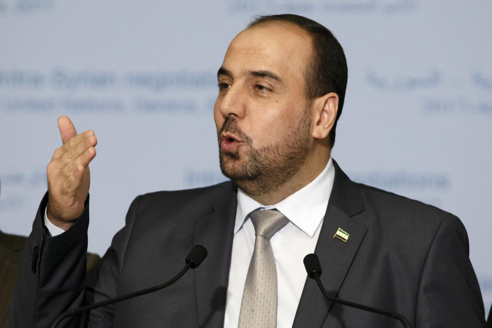 Syria's main opposition High Negotiations Committee, HNC, leader Nasr al-Hariri speaks during a press conference, after a round of negotiation between the HNC and the UN Special Envoy for Syria Staffan de Mistura at the European headquarters of the United Nations in Geneva, Switzerland, Monday, Feb. 27, 2017. (Salvatore Di Nolfi/Keystone via AP)