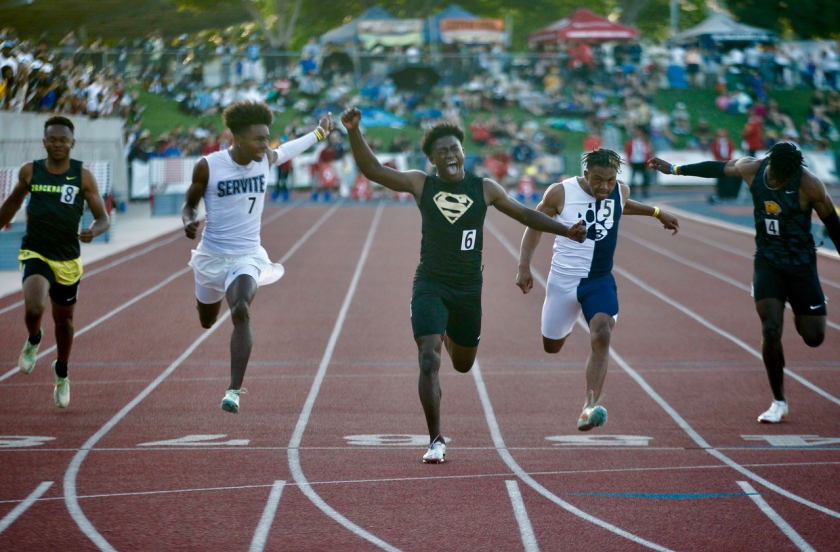 Gardena Serra's Roderick Pleasant, center, celebrates after winning.