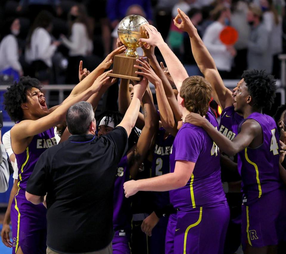 The Richardson Eagles hold up their trophy after beating Byron Nelson, 66-32 in a 6A Region I Regional Semifinal Boys Basketball playoff game played on March 2, 2021 at Rock Hill High School in Frisco, TX. (Steve Nurenberg Special to the Star-Telegram)