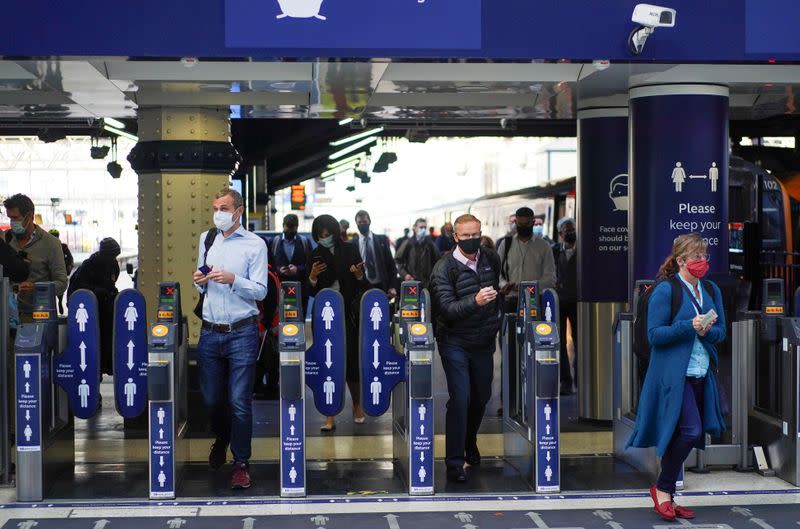 People travel through Waterloo station during rush our, amid the coronavirus disease (COVID-19) outbreak, in London