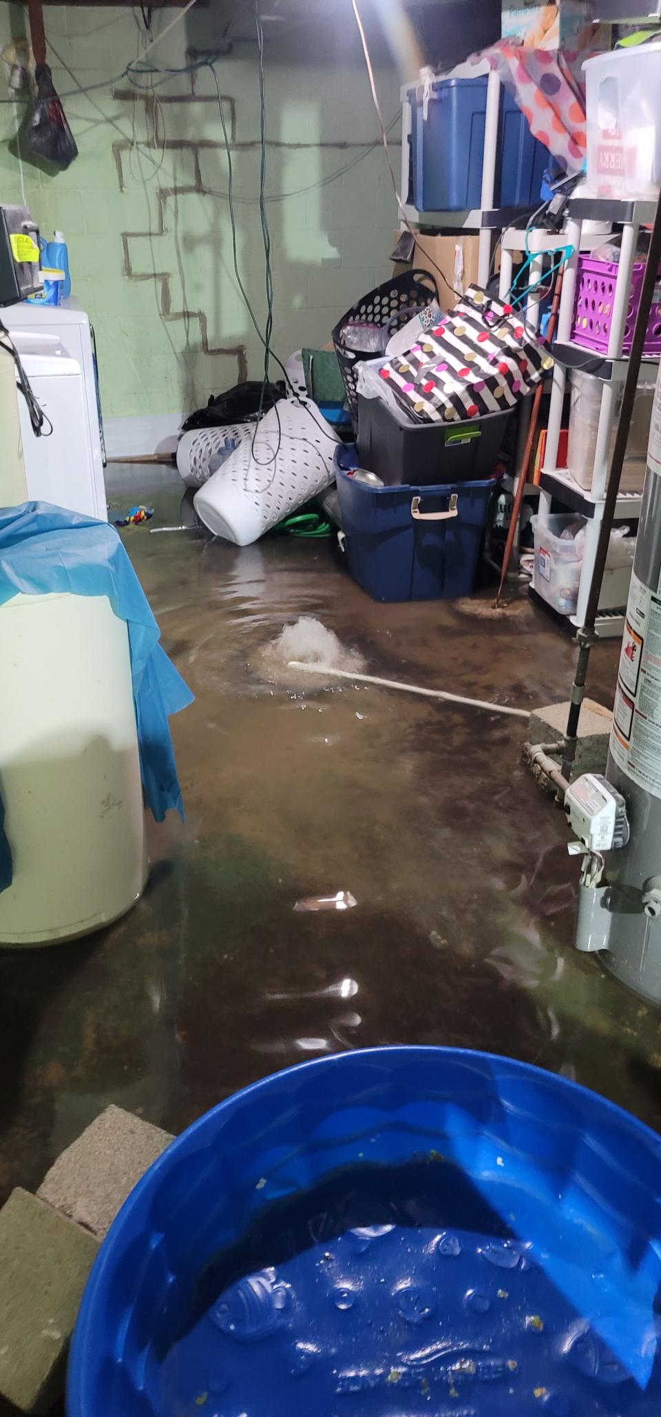 Candice Cavender's basement flooded during North Canton's Saturday night storm.