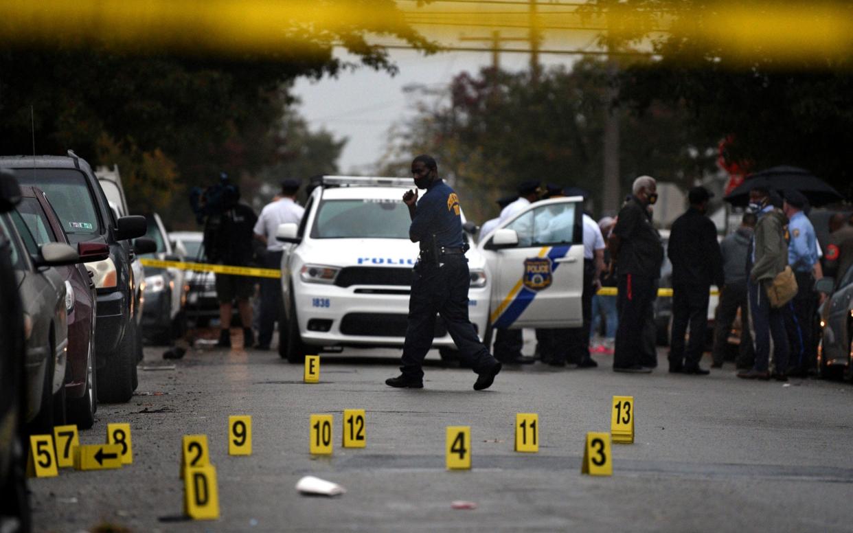 Police secure the scene where 27-year-old Walter Wallace Jr was fatally shot by officers - Tom Gralish /The Philadelphia Inquirer 