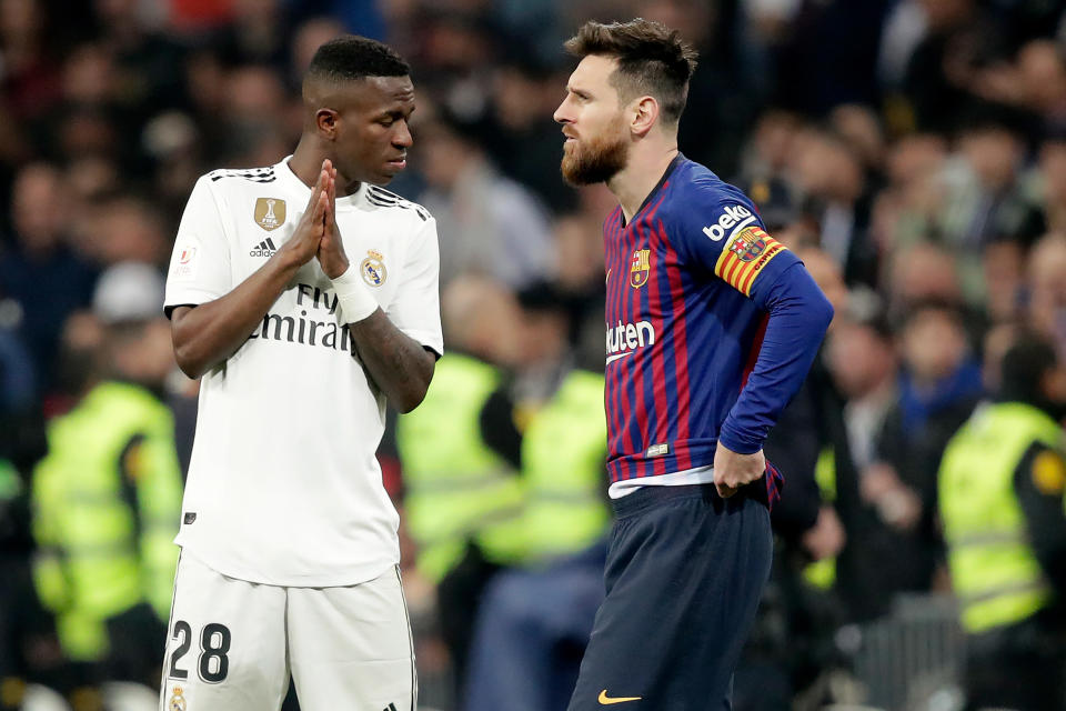 MADRID, SPAIN - FEBRUARY 27: (L-R) Vinicius Junior of Real Madrid, Lionel Messi of FC Barcelona  during the Spanish Copa del Rey  match between Real Madrid v FC Barcelona at the Santiago Bernabeu on February 27, 2019 in Madrid Spain (Photo by David S. Bustamante/Soccrates/Getty Images)