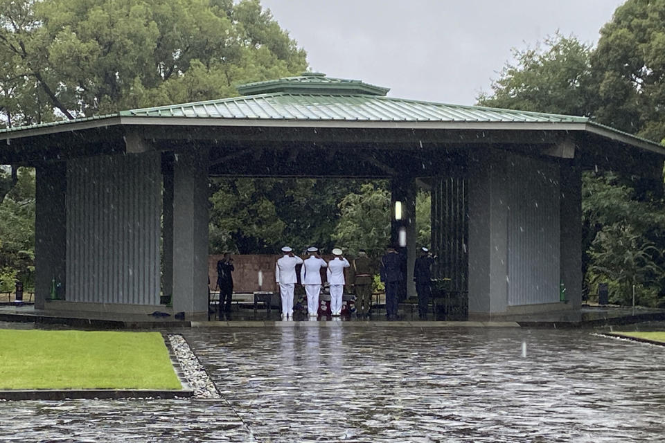 Military officials from Australia, Britain, Canada, the Netherlands, New Zealand and the United States salutes to the unknown Japanese soldiers who died overseas during the World War II after laying a wreath of flowers at the Chidorigafuchi National Cemetery in Tokyo, Monday, Oct. 9, 2023. The memorial was attended by military officials from the embassies of several former allied nations, including Australia, Britain, New Zealand and the U.S. at the cemetery for the unknown Japanese who died overseas during the war. (AP Photo/Mari Yamaguchi)