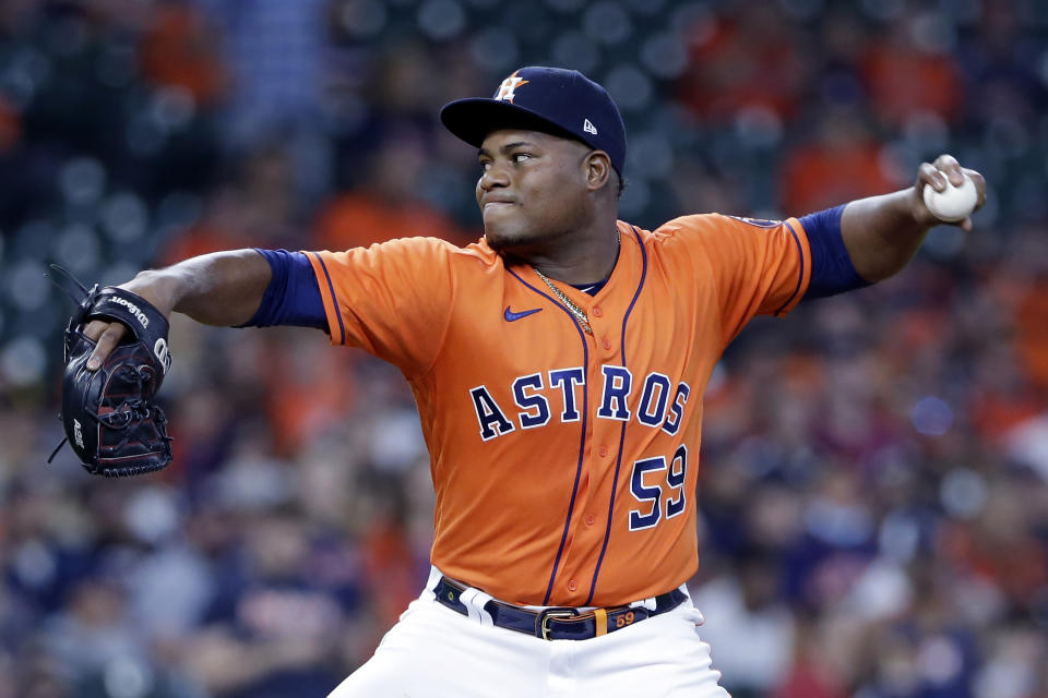 Houston Astros starting pitcher Framber Valdez throws to a San Diego Padres batter during the first inning of a baseball game Friday, May 28, 2021, in Houston. (AP Photo/Michael Wyke)