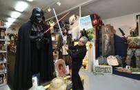 Steve Sansweet pretends to fight a Darth Vader statue at Rancho Obi-Wan, a non-profit museum on the outskirts of San Francisco