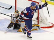 Slovakia's Marko Dano (R) scores on Germany's goalie Marvin Cupper during the first period of their IIHF World Junior Championship ice hockey game in Malmo, December 27, 2013. REUTERS/Alexander Demianchuk (SWEDEN - Tags: SPORT ICE HOCKEY)