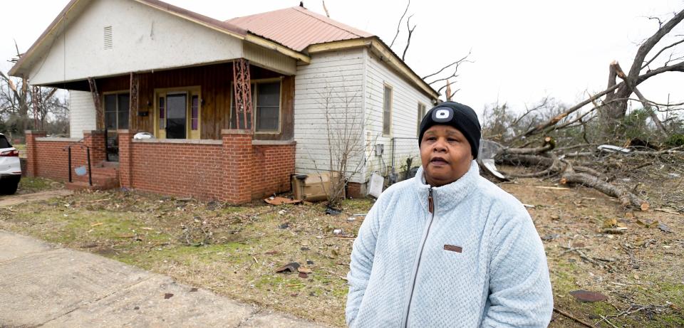 Pearlie Miller talks about the damage to her home in Selma, Alabama, on Friday after a storm ripped through the city the day before, on Jan. 12, 2023.