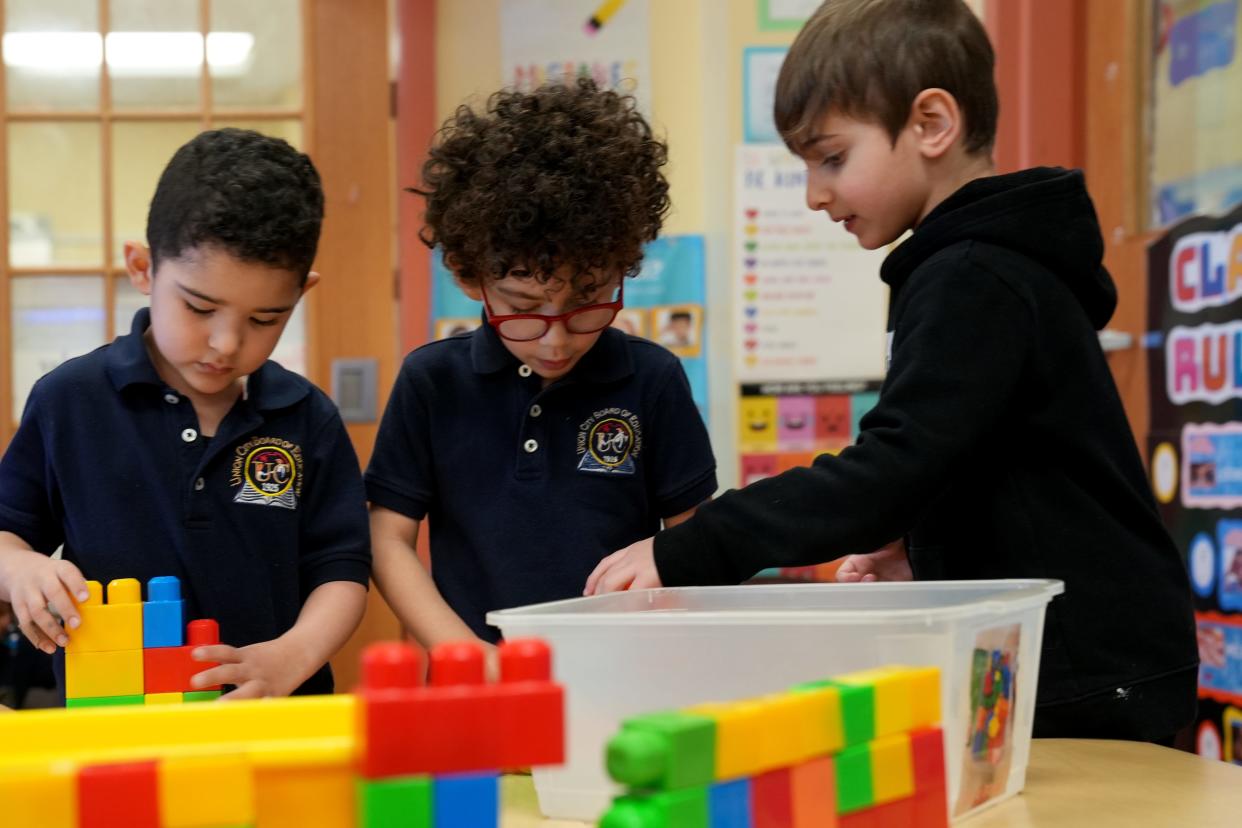 Zain Moharam, Enzo Rodriguez and Rayan Shehadeh play with legos at the Eugenio Maria De Hostos Center for Early Childhood Education, Thursday, March 14, 2024, in Union City.