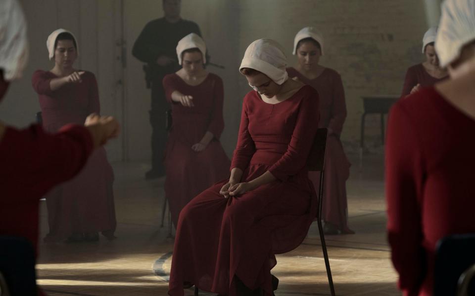 Offred, one the few fertile women known as Handmaids in the oppressive Republic of Gilead, struggles to survive as a reproductive surrogate - Credit: MGM