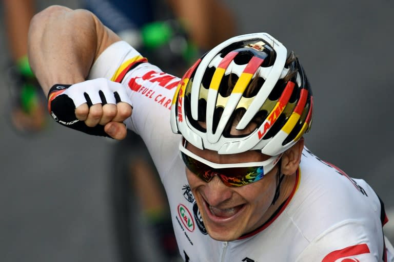 Germany's Andre Greipel celebrates as he crosses the finish line to win the final stage of the Tour de France on July 24, 2016