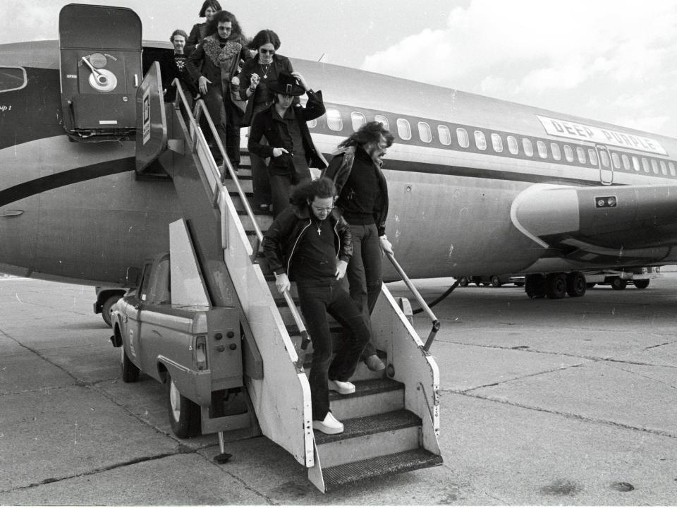 Deep Purple members disembarking the Starship during their 1974 tour.