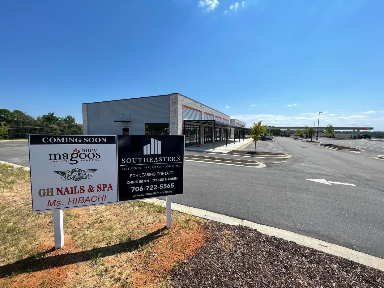 Commercial strips being constructed near the new Kroger Marketplace on Harper Franklin Avenue in Augusta will include new businesses including a Huey Magoo's Chicken Tenders restaurant.