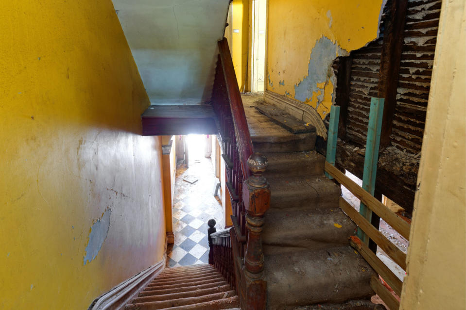 A dilapidated staircase inside a home at Darlinghurst in Sydney.