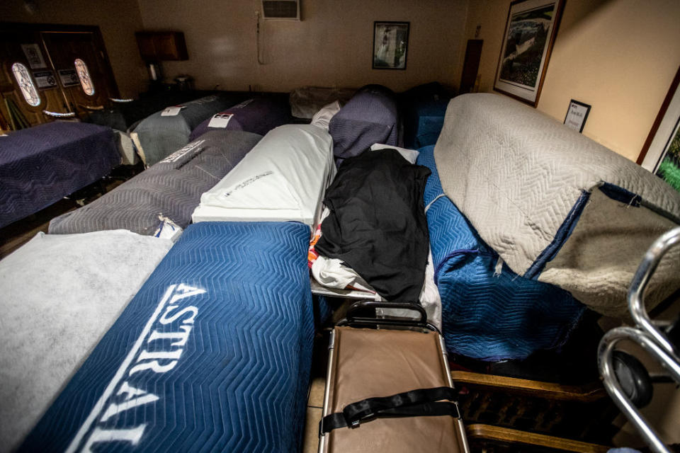  A break room is filled with bodies inside caskets at Continental Funeral Home. 