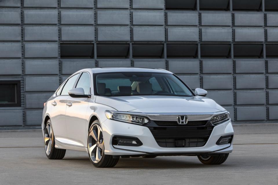 <p>If you want to stick with Honda, but need something a bit bigger, <a rel="nofollow noopener" href="https://www.roadandtrack.com/new-cars/first-drives/a13818067/2018-honda-accord-review/" target="_blank" data-ylk="slk:the Accord;elm:context_link;itc:0;sec:content-canvas" class="link ">the Accord</a> is another fantastic choice. It drives great, both with the base 1.5-liter turbo engine or with the Type-R derived 2.0-liter. Of course, if you want the full experience, you'll have to option the six-speed manual transmission. <a rel="nofollow noopener" href="https://www.ebay.com/itm/2018-Accord-Sport-2-0T/223199525399?hash=item33f7ba7a17:g:oj4AAOSwMjtbzpPv:rk:1:pf:0&vxp=mtr" target="_blank" data-ylk="slk:Here's one;elm:context_link;itc:0;sec:content-canvas" class="link ">Here's one</a> with the 2.0T and the manual listed for under $30,000. </p>