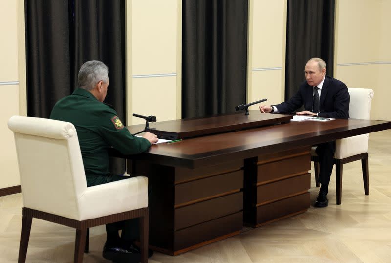 Russian President Vladimir Putin meets Defence Minister Sergei Shoigu