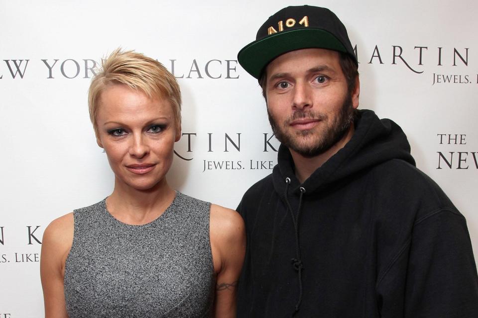 Pamela Anderson and Rick Salomon attend The Martin Katz Jewel Suite Debuts At The New York Palace Hotel on November 13, 2013 in New York City.